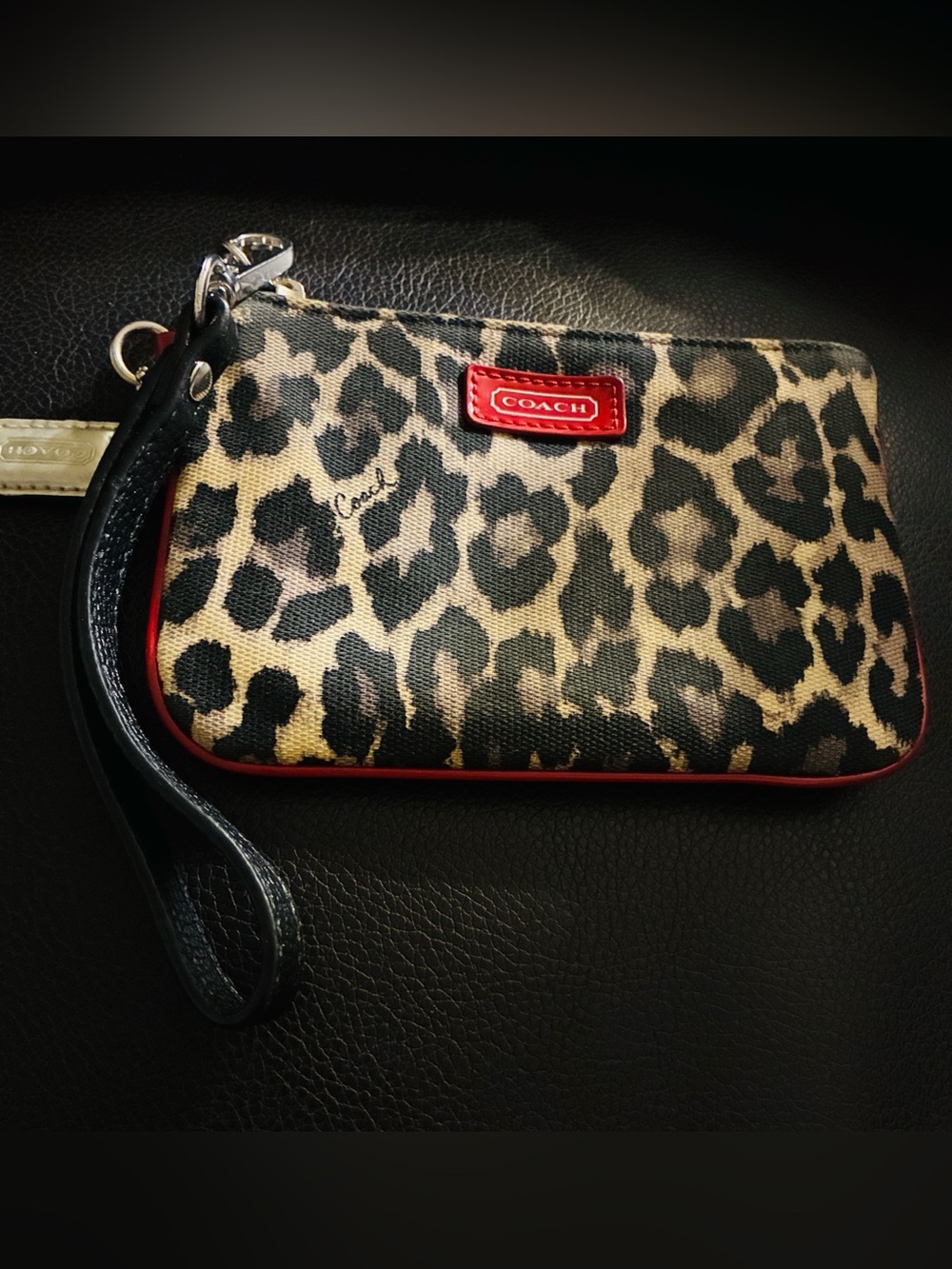 Coach Leopard Print Wristlet with Red Trim and Black Strap
